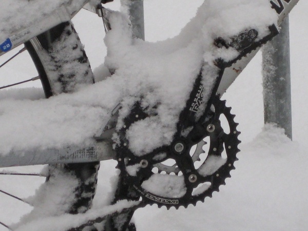 mountain bike snowed in snow