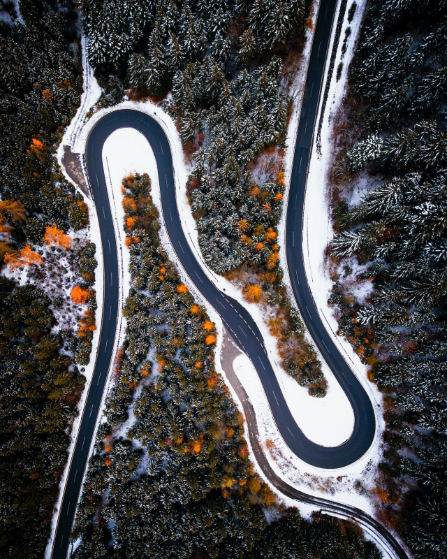 natural winter scene picture snowy curvy road forest contrast high view