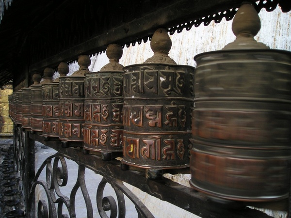 nepal prayer wheels turn