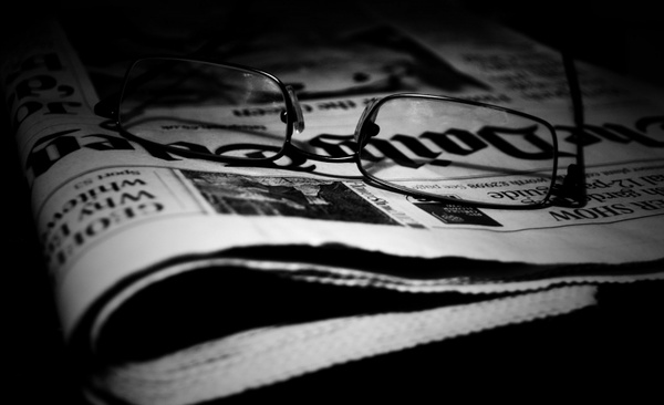 newspapers and glasses