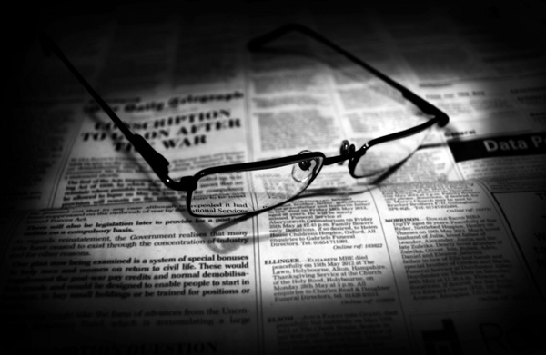 newspapers and glasses 