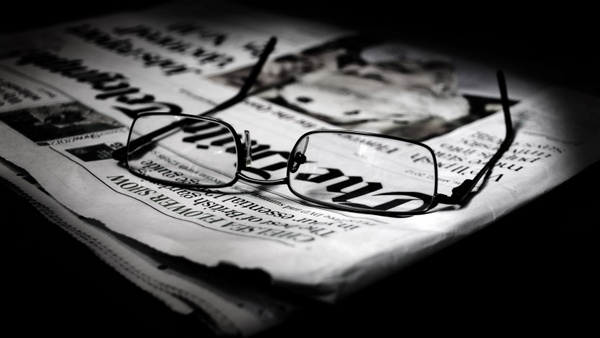 newspapers and glasses 