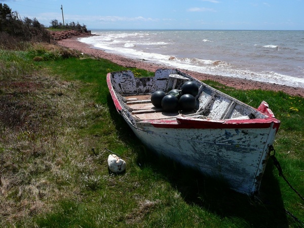 old fishing boat beach shoreline