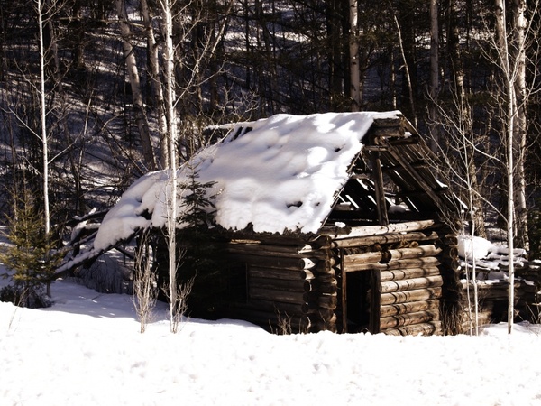 old log cabin winter snow