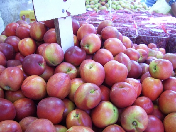 plums in market stall