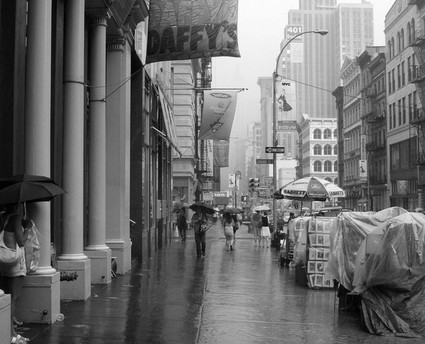 rain on broadway soho new york city bw