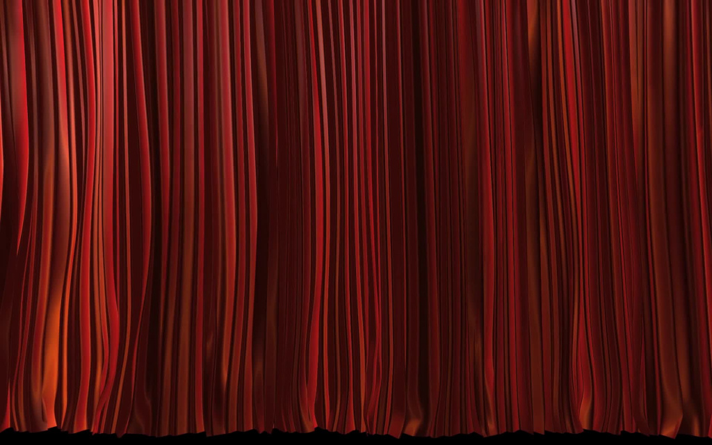 red curtain swinging on stage