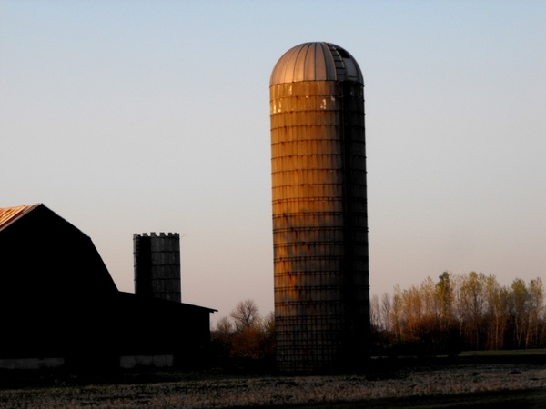 semi silhouette of barn