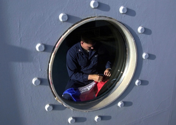ship porthole man