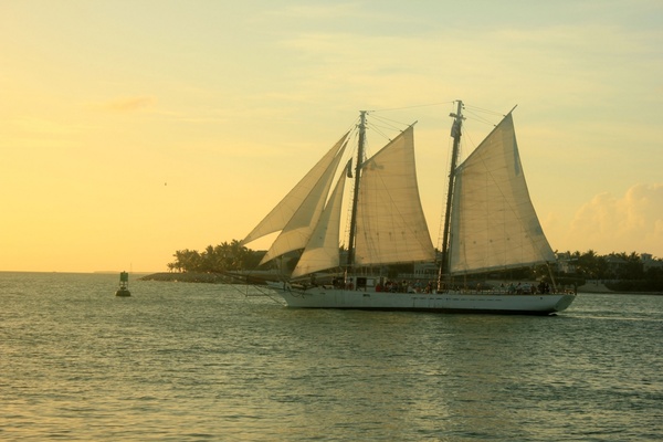 ships sailing into the sunset at key west florida