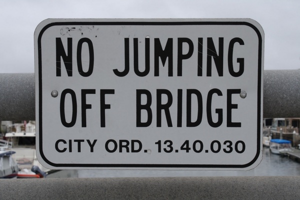 sign no jumping off bridge 