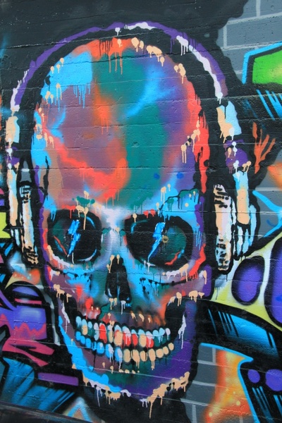 skull and crossbones graffiti wall