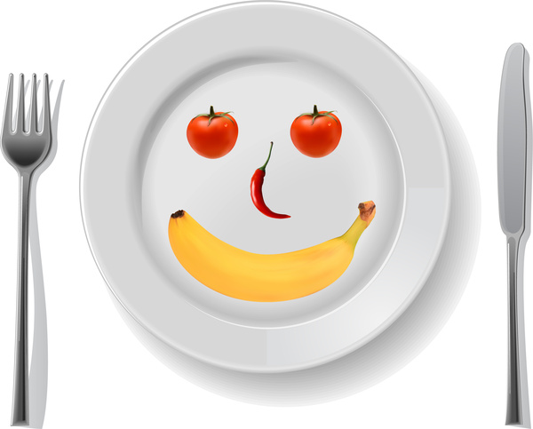 smile disk with fruit spoon fork and knife