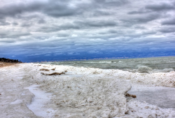 snow covered shores at kohler andrae state park wisconsin