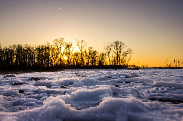 snowy sunset path at horicon national wildlife reserve wisconsin 