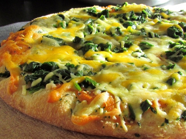 spinach pizza cheese yellow