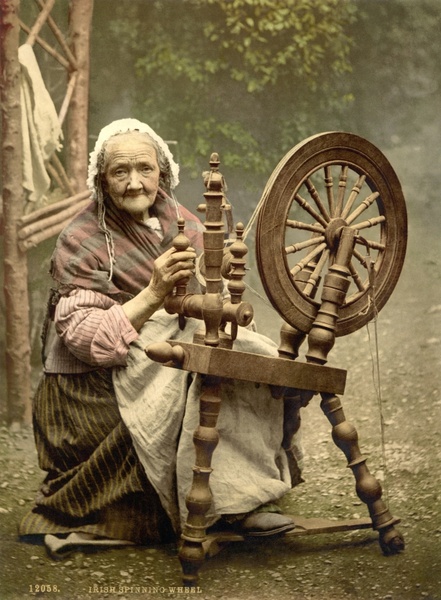 spinning wheel woman old