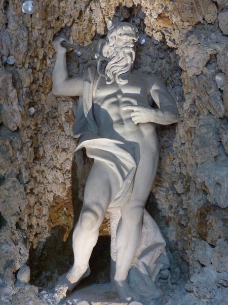 stone figure neptune man