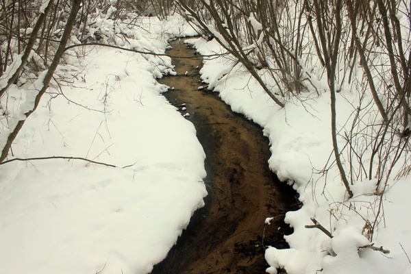 stream in the winter time at mirror lake state park wisconsin