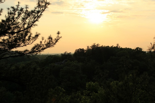 sun over hills at starved rock state park illinois 