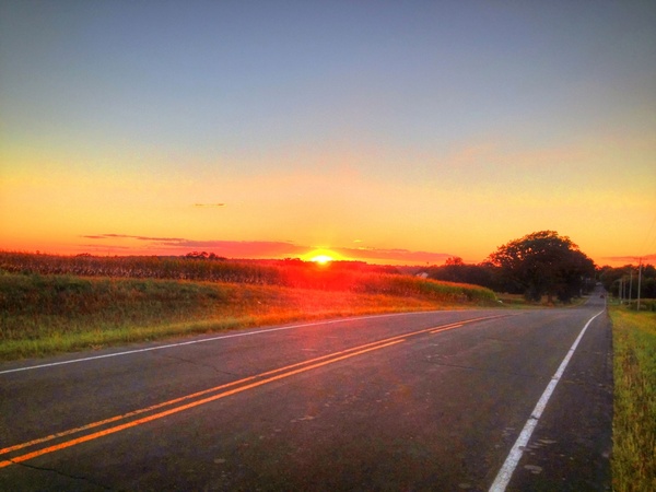sunset on the country road in southern wisconsin 