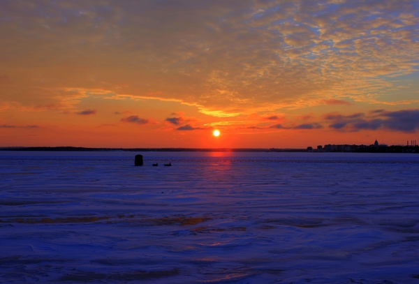 sunset over icy lake in madison wisconsin