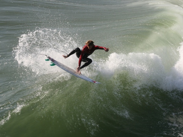 surfer goes airborne