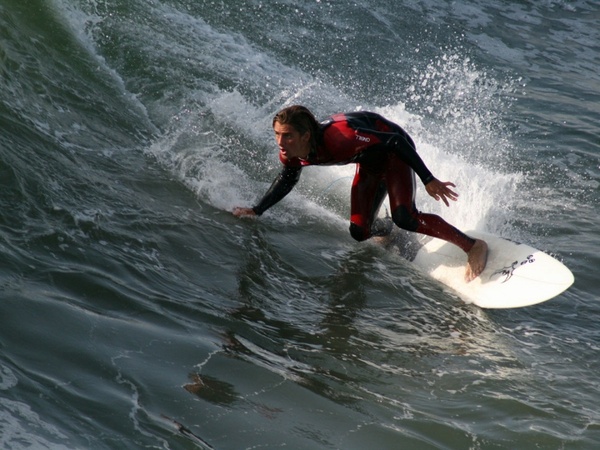 surfer surfing huntington