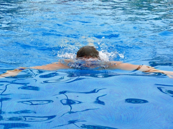 swimming man water