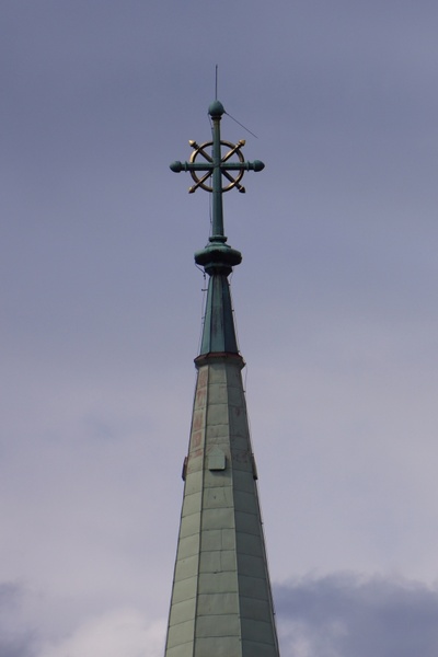 the church tower cross lightning rod