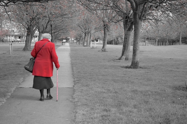 the old lady in a red coat