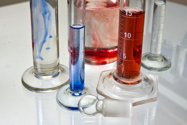 transparent chemistry glass tubes filled with substances