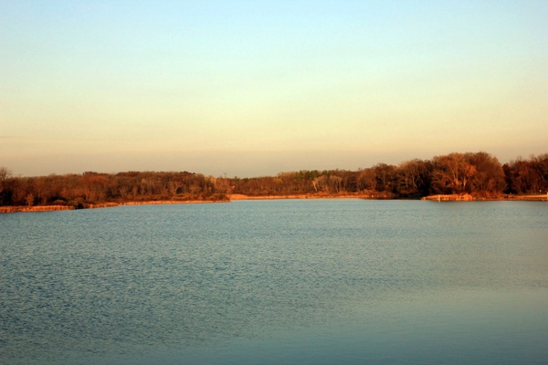 view of lake olson close to sunset at rock cut state park illinois 