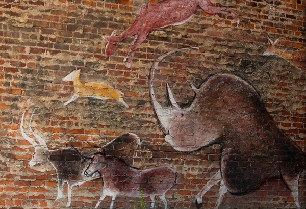 wall mural prehistoric style street art