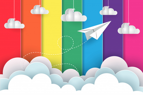 white paper planes fly on the background rainbow colorful while flying above a cloud creative idea illustration cartoon vector