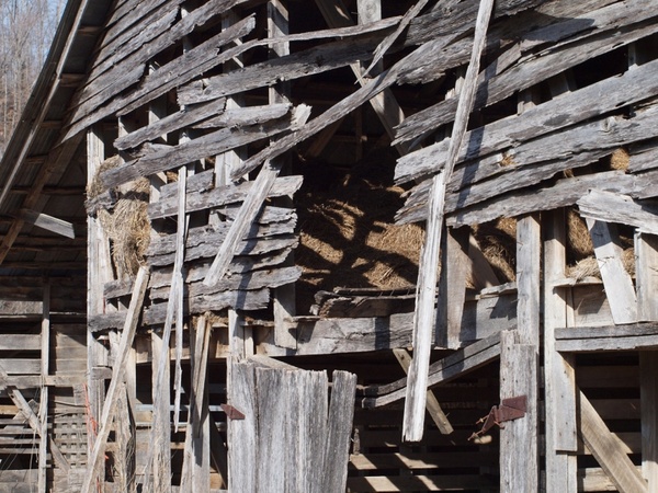 wooden barn falling down