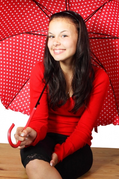 young woman with red umbrella