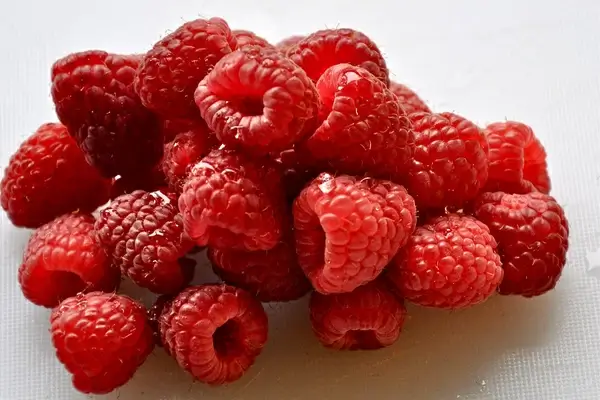 a mound of raspberries