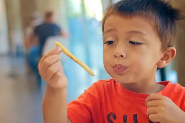 alex stares down his french fry