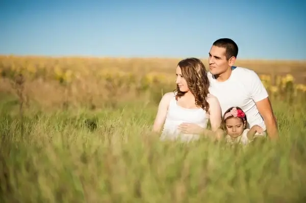 beach child couple field girl grass love maternity