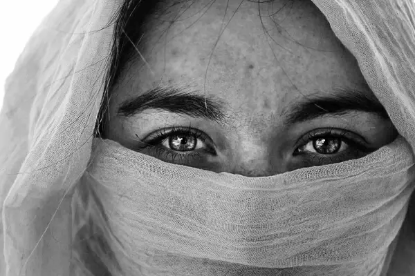 black white photo of muslim woman
