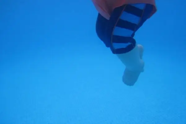 blue underwater infant