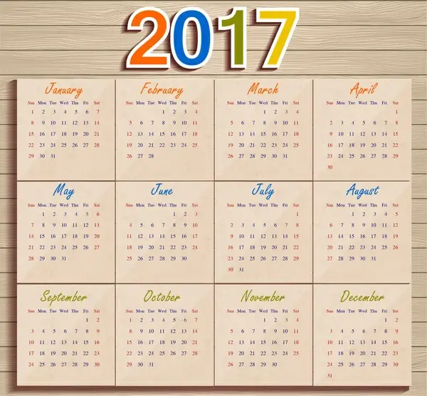 calendar 2017 templates paper on wooden background