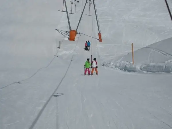 children ski skiing