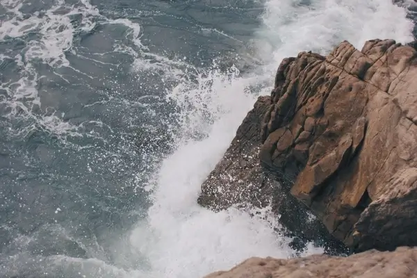 cliff down ocean rock sea stone water wave