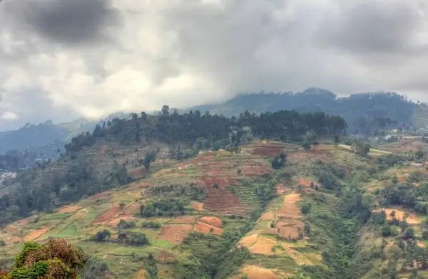 clouds over terraces near haiti baptist mission