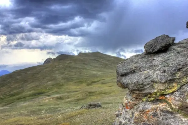 clouds over the peak at rocky mountains national park colorado