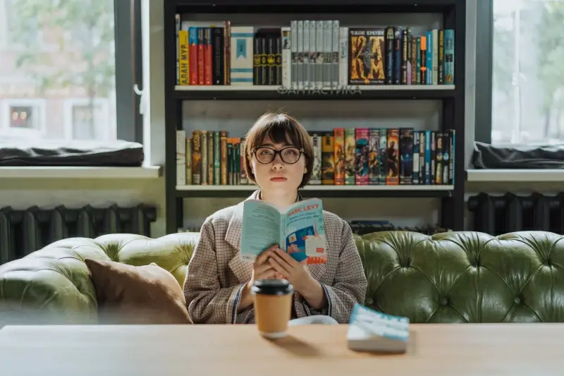 education picture girl reading book 