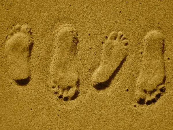 footprints steps sand