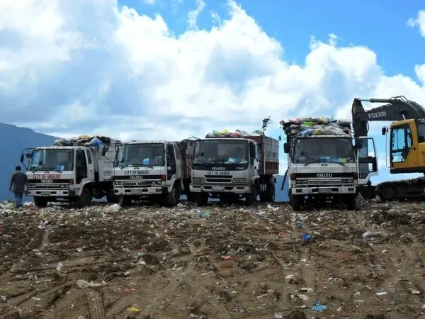 garbage trucks dump